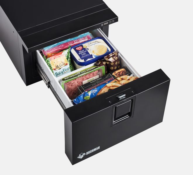 Opened Bushman DF30-HD Fridge with meat and vegetables inside