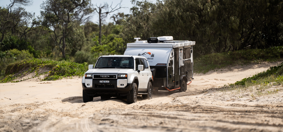 Four wheel drive pulling a caravan with a Bushman Fridge installed